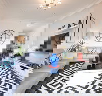 The Clock House Beachfront - Accommodation Brisbane