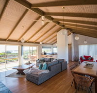 Sunsets on Martyrs Beach House - Ocean Views - Accommodation Brisbane