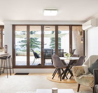 Beachfront Manly Apartment With Parking and Balcony - Accommodation Brisbane